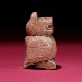 A Rare Archaic jade Auspicious BeastOrnament