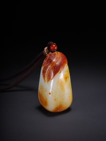 A Rare Hetian Jade Monkey-Shaped Ornament