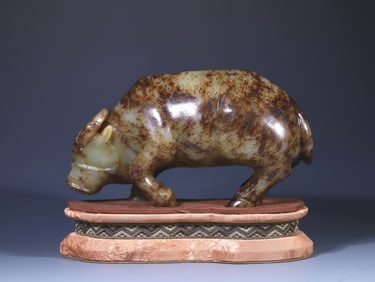 A Rare Hetian Jade Buffalo-Shaped Ornament
