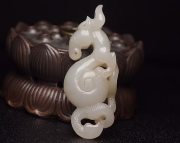 A Rare Hetian Jade Auspicious Beast-Shaped Pendant