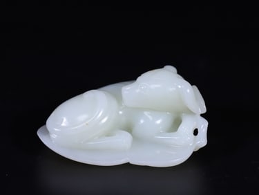 A Rare Hetian Jade Dog-Shaped Ornament