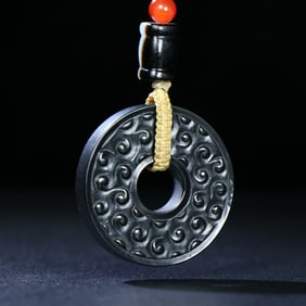 A Rare Archaic Jade Black Jade Bi Disc