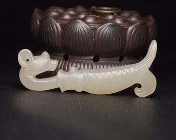 A Rare Hetian Jade Dragon-Shaped Pendant