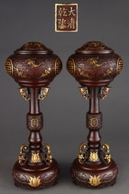 A pair of Gilt Red Copper Hatstands