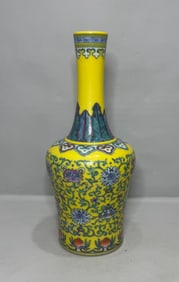 A Rare Yellow Ground Doucai Lotus and Eight Treasures Patterns Vase