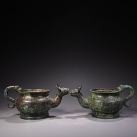 A pair of Rare Bronze Dragon-head Ox Pots