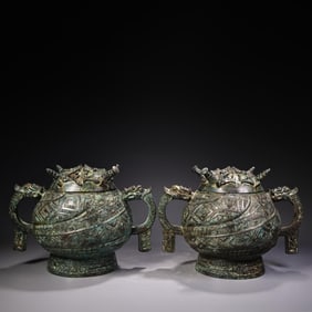A pair of Rare Bronze Tripod Censers
