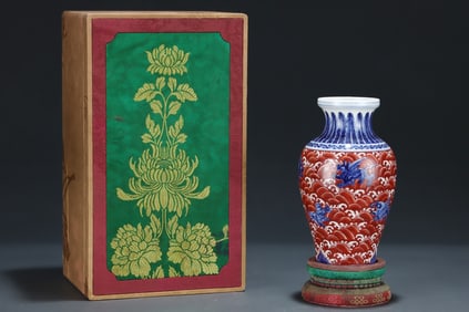 A Rare Iron-Red Auspicious Beast Pattern Vase