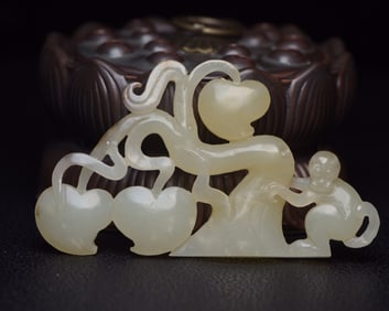 A Rare Hetian Jade Monkey-Shaped Pendant