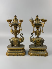 A pair of Rare Gilt Copper Elephant Candlestick