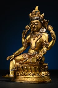 A Rare Gilt Bronze Four-Arm Avalokitesvara Seated Statue