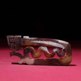 A Rare Archaic Jade Full Red Dragon Pendant