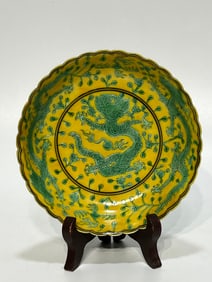A Rare Yellow Ground Green Glazed Hidden Dragon Pattern Plate