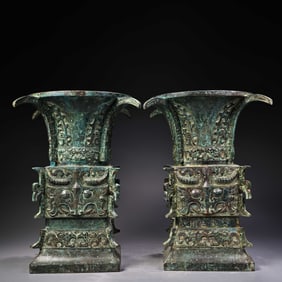 A pair of Rare Bronze Heaven-round Earth-square Beast-faced Vases