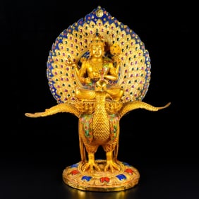 A Rare Gilt Copper Mahamayuri Buddha statue