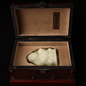 A Rare Luminous Stone Carved Maitreya Buddha