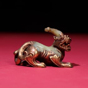 A Rare Hetian Jade Gilt Auspicious Beast