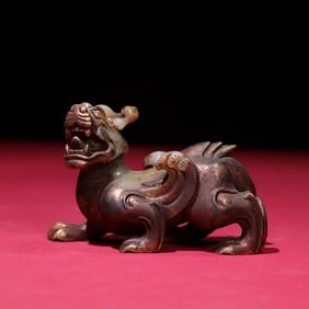 A Rare Gilt Auspicious Beast Ornament
