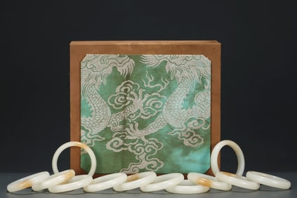 A Set of Rare White Jade Bracelets