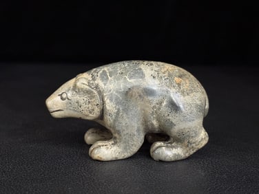 An Exquisite White Jade Bear Ornament