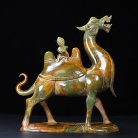An Exquisite White Jade Camel Ornament