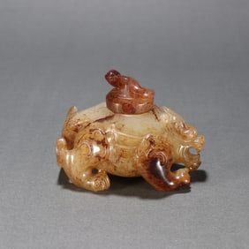 An Exquisite White Jade Auspicious Beast Ornament
