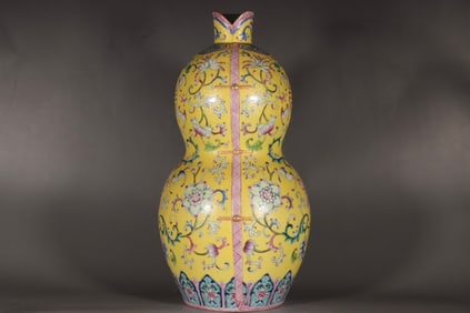An Exquisite Famille-Rose Yellow Glazed Lotus Pattern Bats and Peach Pattern Vase