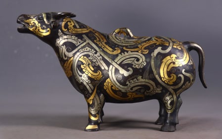 An Exquisite Bronze Inlaid Gold and Silver Buffalo Ornament