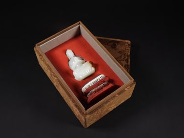 An Exquisite White Jade Buddha Statue