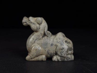 An Exquisite White Jade Auspicious Beast Ornament