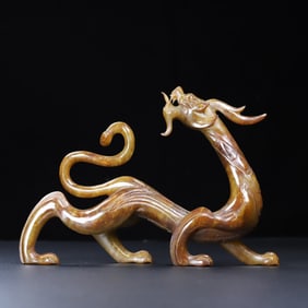 An Exquisite White Jade Dragon Ornament