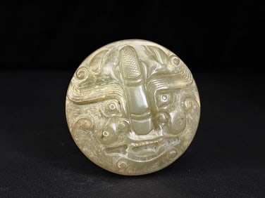 An Exquisite White Jade Beast-Face Pattern Ornament