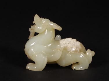 An Exquisite White Jade Auspicious Beast Ornament
