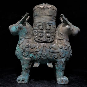 An Archaic Bronze Beast-Face Pattern Beast-Shaped Zun,With Inscription