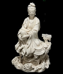 A Solemn Blance-De-Chine Statue of Avalokitesvara
