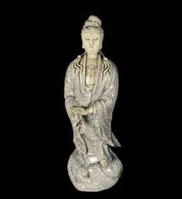 A Solemn Blance-De-Chine Statue of Avalokitesvara