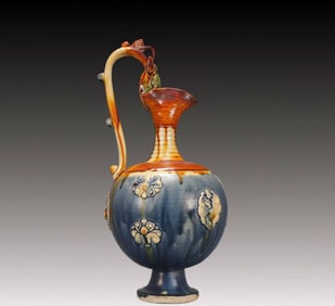 A Rare Tang Tri-Color Glazed Pottery Flower Pattern Dragon-Handle Ewer