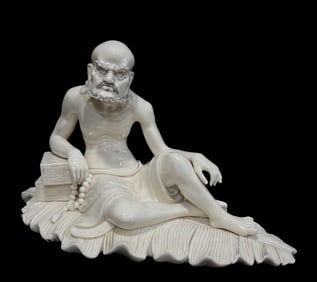 A Solemn Blance-De-Chine Statue of Arhat