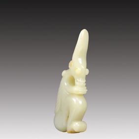 A Rare White Jade Auspicious Beast Ornament