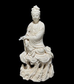 A Solemn Blance-De-Chine Statue of Avalokitesvara