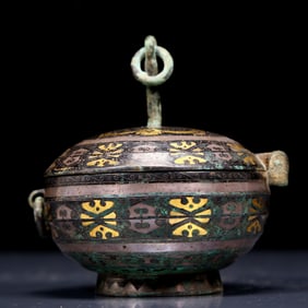 A Rare Bronze Inlaid Gold and Silver Candlestick