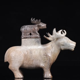 An Exquisite White Jade Auspicious Beast Ornament