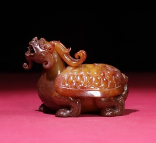 An Exquisite White Jade Auspicious Beast Ornament