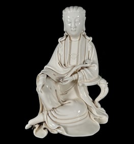 A Solemn Blance-De-Chine Statue of Avalokitesvara
