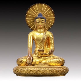 A Solemn Gilt Bronze Statue of Sakyamuni