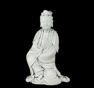 A Solemn Blance-De-Chine Statue of Avalokitesvara
