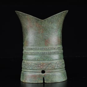 An Archaic Bronze Beast-Face Pattern Libation Cup