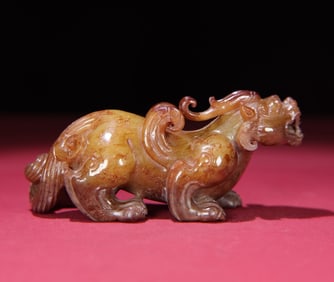 An Exquisite White Jade Auspicious Beast Ornament