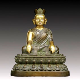 A Solemn Gilt Bronze Statue of Guru
