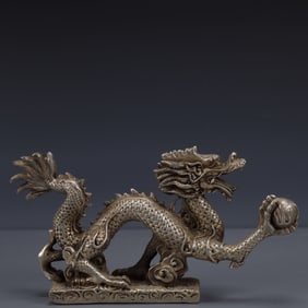 An Exquisite Silver-plated Bronze Dragon Ornament